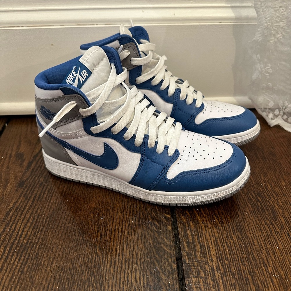 Blue and grey air Jordan 1’s.